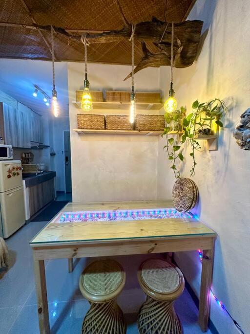 Native Themed Staycation In Qc Apartment