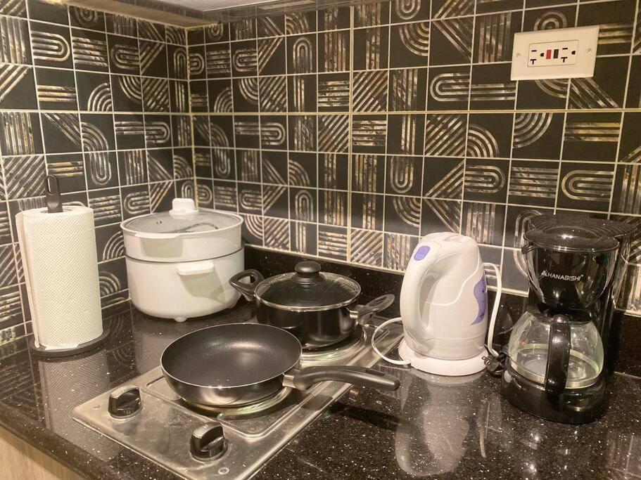 Apartment 1br Fame Residences Mandaluyong- Be My Guest Staycation- Near Sm Megamall, Greenfield District, & Ortigas Manila