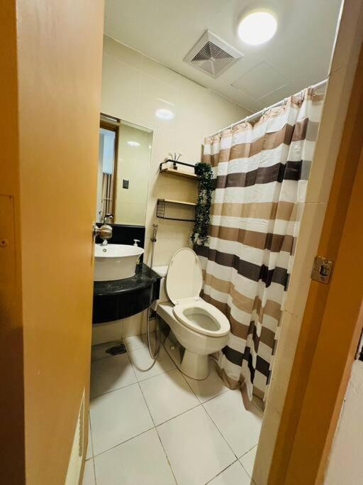 Budget Friendly Staycation Walking Distance To Venice Mall With Netflix And Wifi Manila
