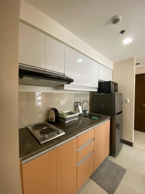 Apartment Mckinley 1br Near Venicegrandcanal Fiberwifi Manila