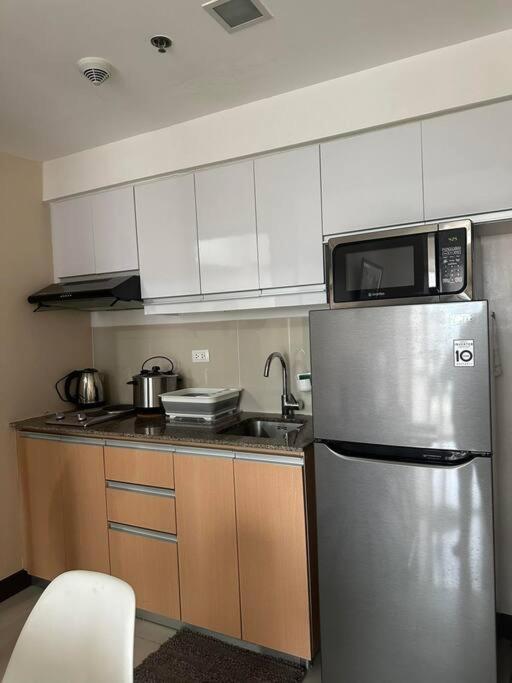 Apartment Mckinley 1br Near Venicegrandcanal Fiberwifi Manila