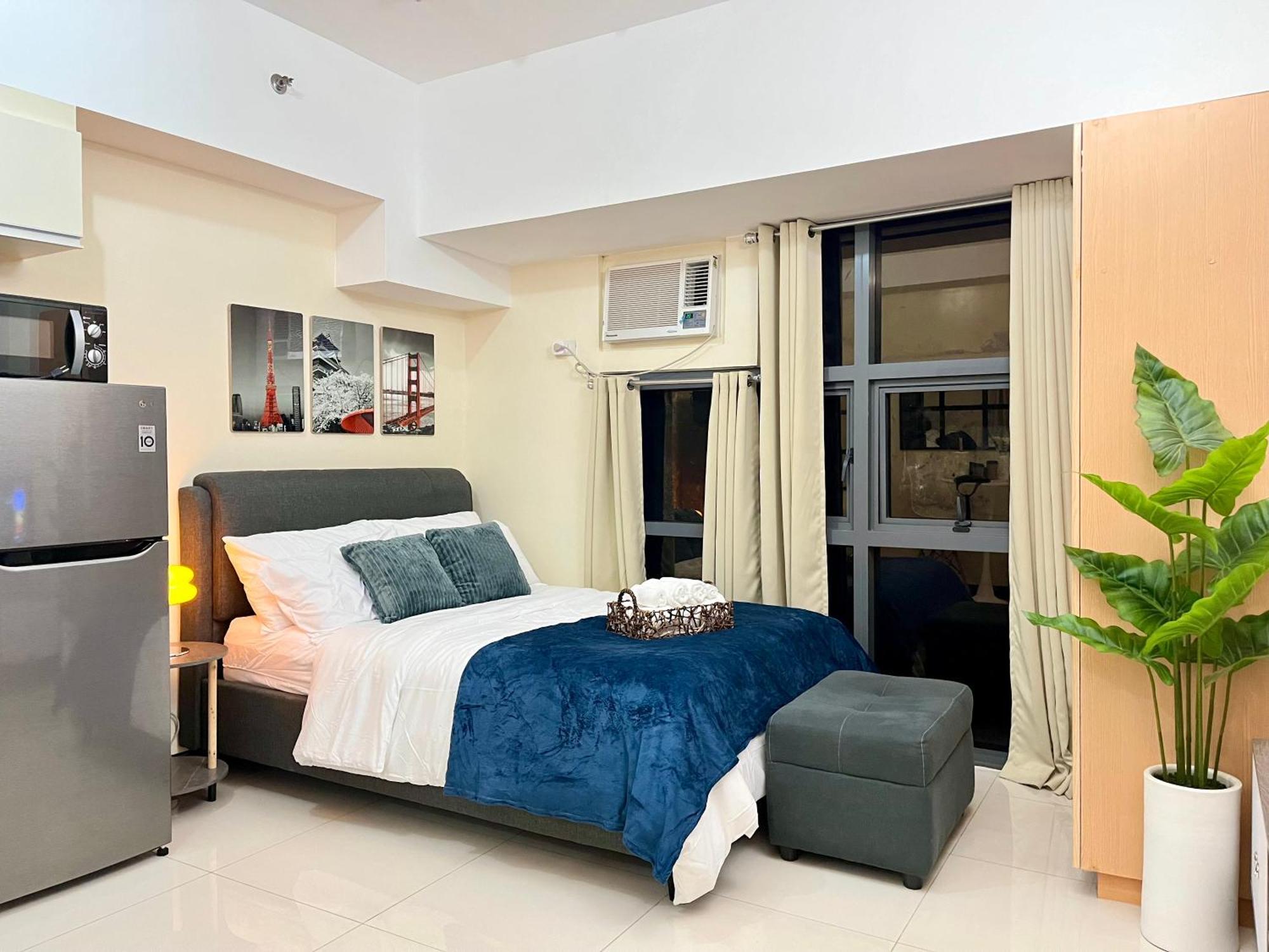 Apartment Mckinley Bgc Sleek Luxury Studio, Pool & Wi-fi