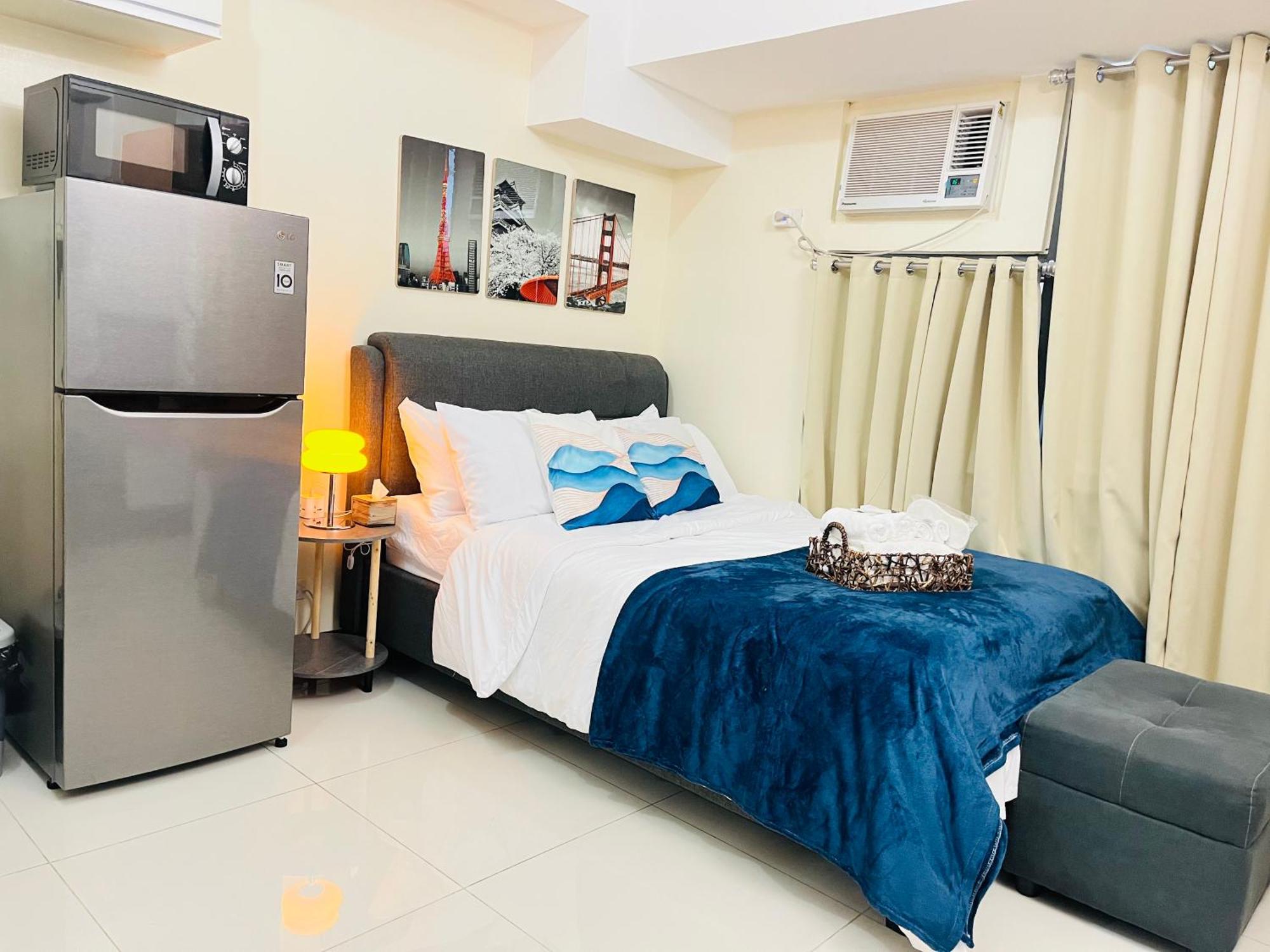 Mckinley Bgc Sleek Luxury Studio, Pool & Wi-fi *