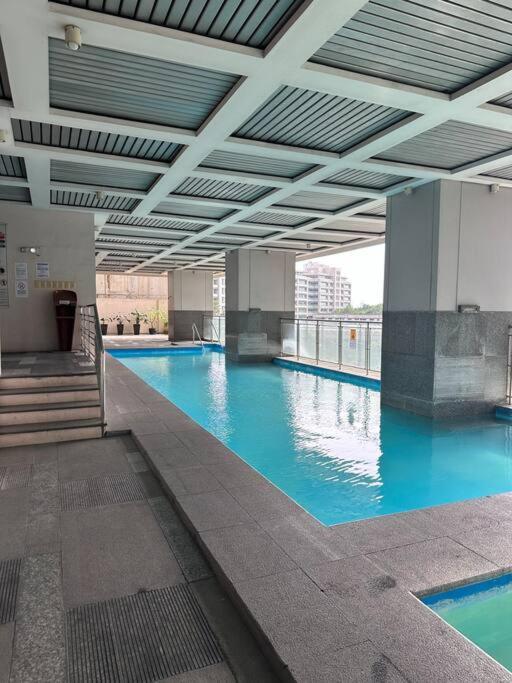Apartment W Projector Wifi Netflix And Pool Access In Adb Tower Ortigas Cbd Manila