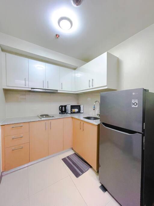 Cozy 1br Uptown Parksuites Manila