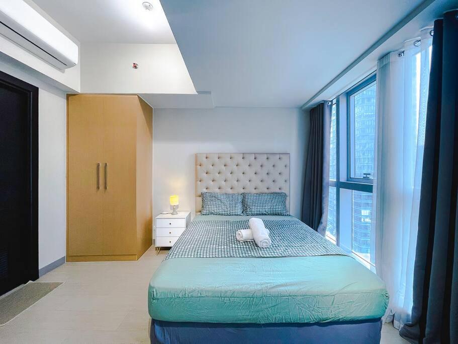 Cozy 1br Uptown Parksuites *