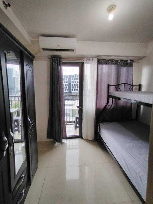 Apartment Shore 1 Residences - Moa View With 2 Bunkbeds