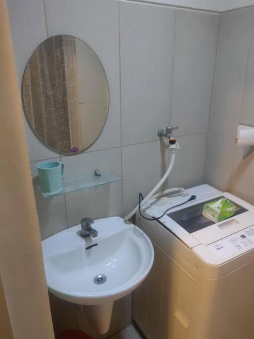 With Two Single Beds And Balcony Facing View Apartment Manila