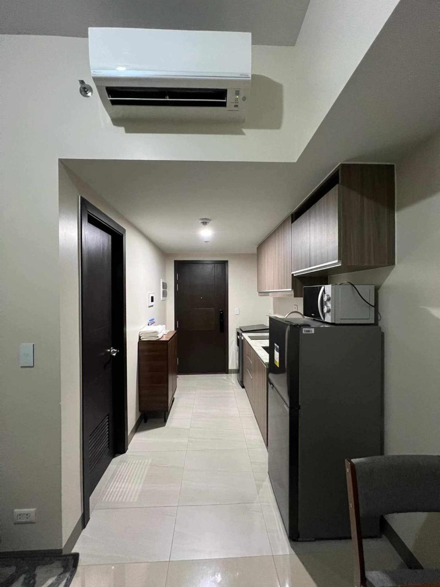 At Park Mckinley West Apartment Manila