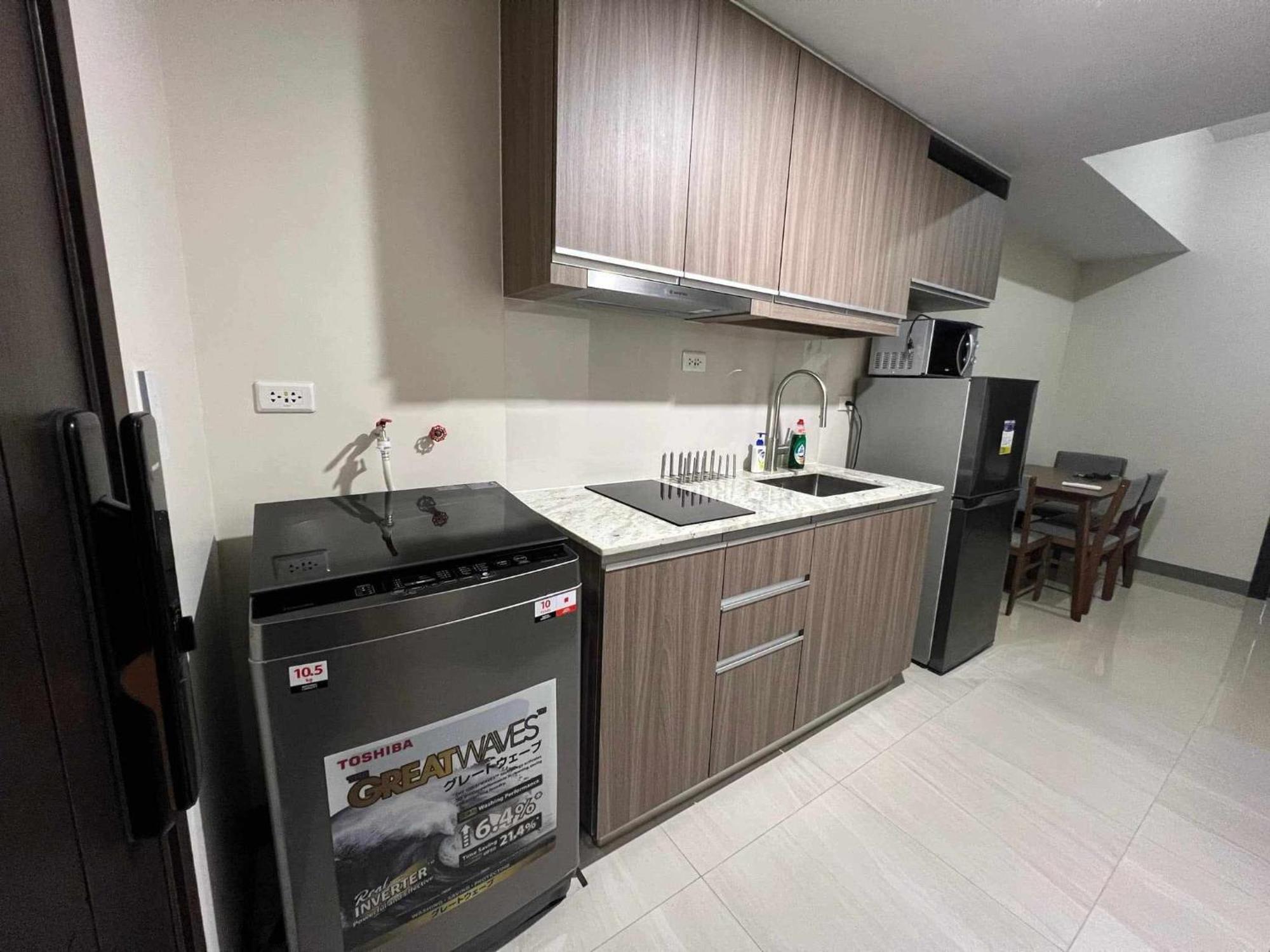 At Park Mckinley West Apartment Manila