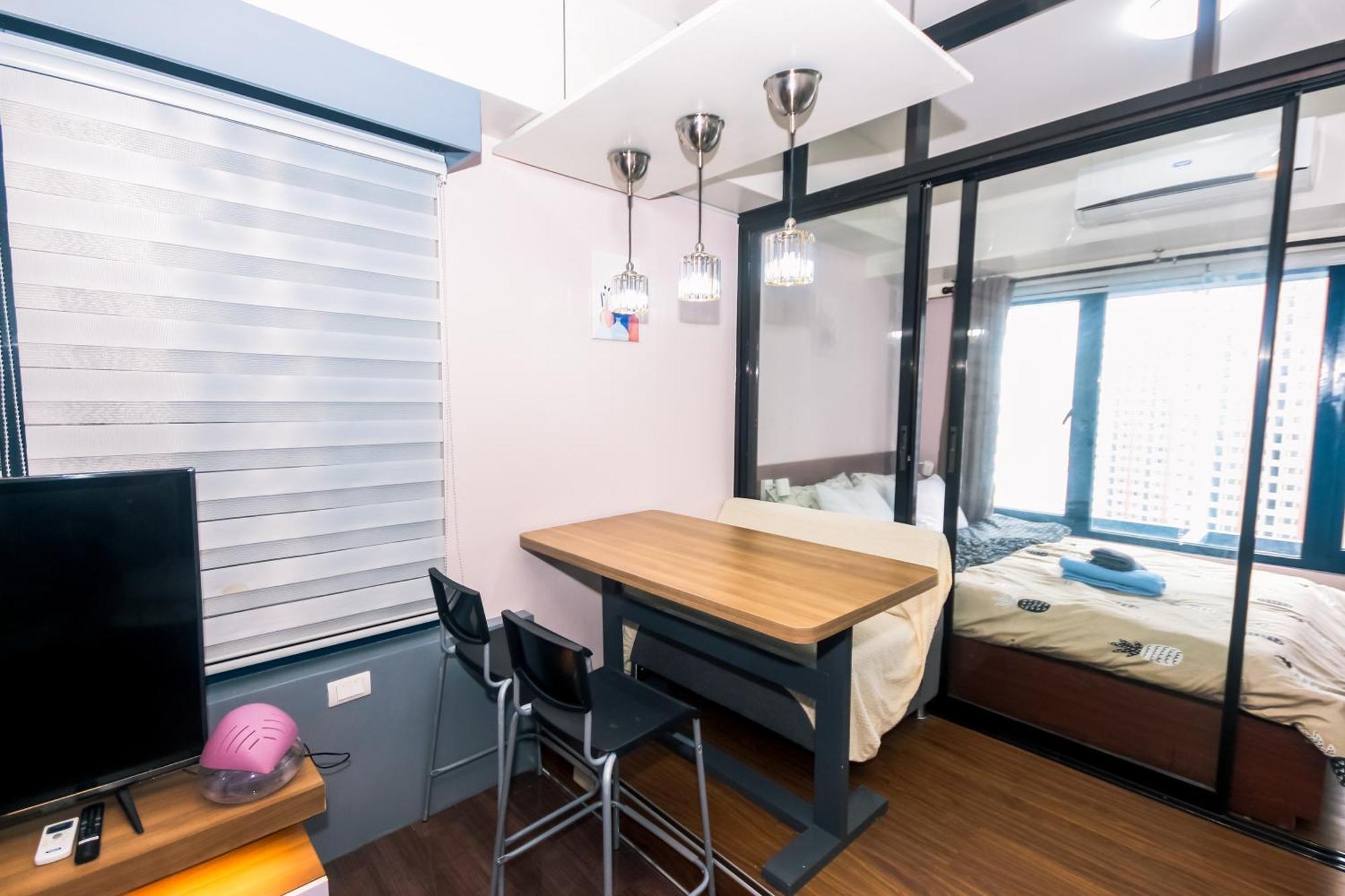Traveler's Playground Makati Gym Swim Park Interrnet 300 Mb Apartment Manila