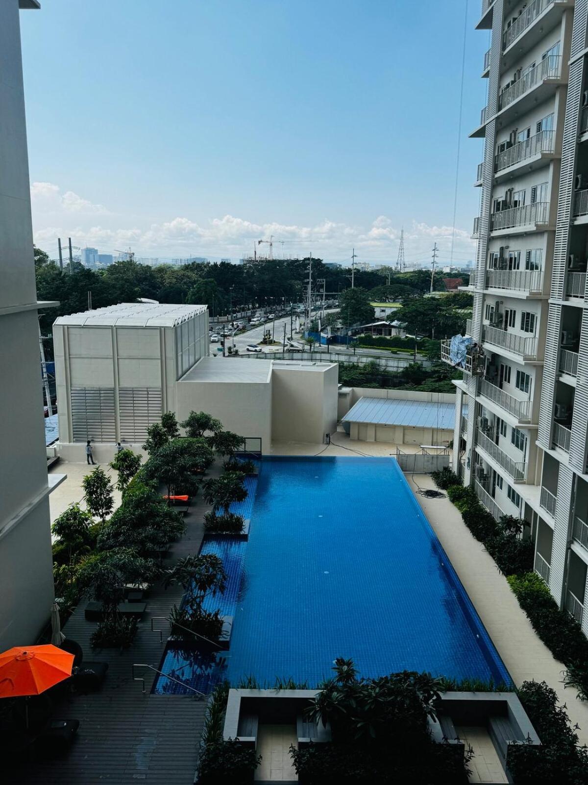 Apartment Cozy 1br At Park Mckinley West Near Bgc & Venice Mall
