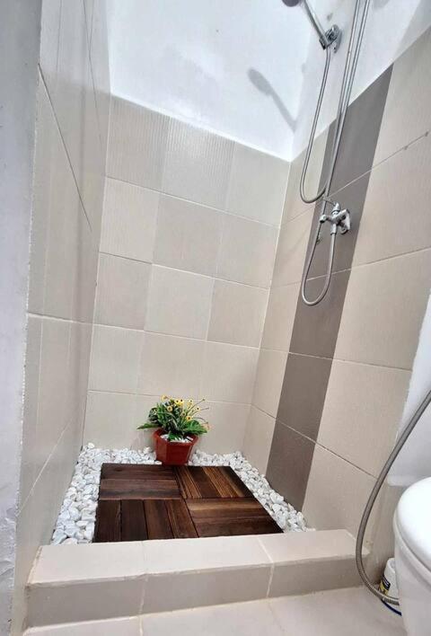 Cozy 1br With Sofabed And Wifi In Grace Res Apartment Manila