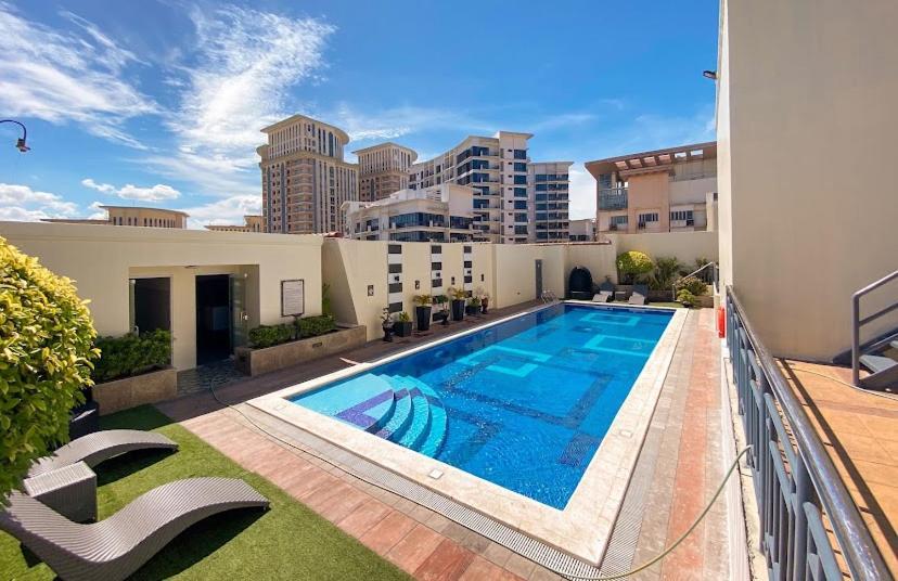 Aparthotel Jl Staycation Near Venice Grand Canal Mall