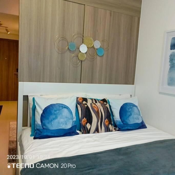 Cozy New 1br Fame Residences With Balcony