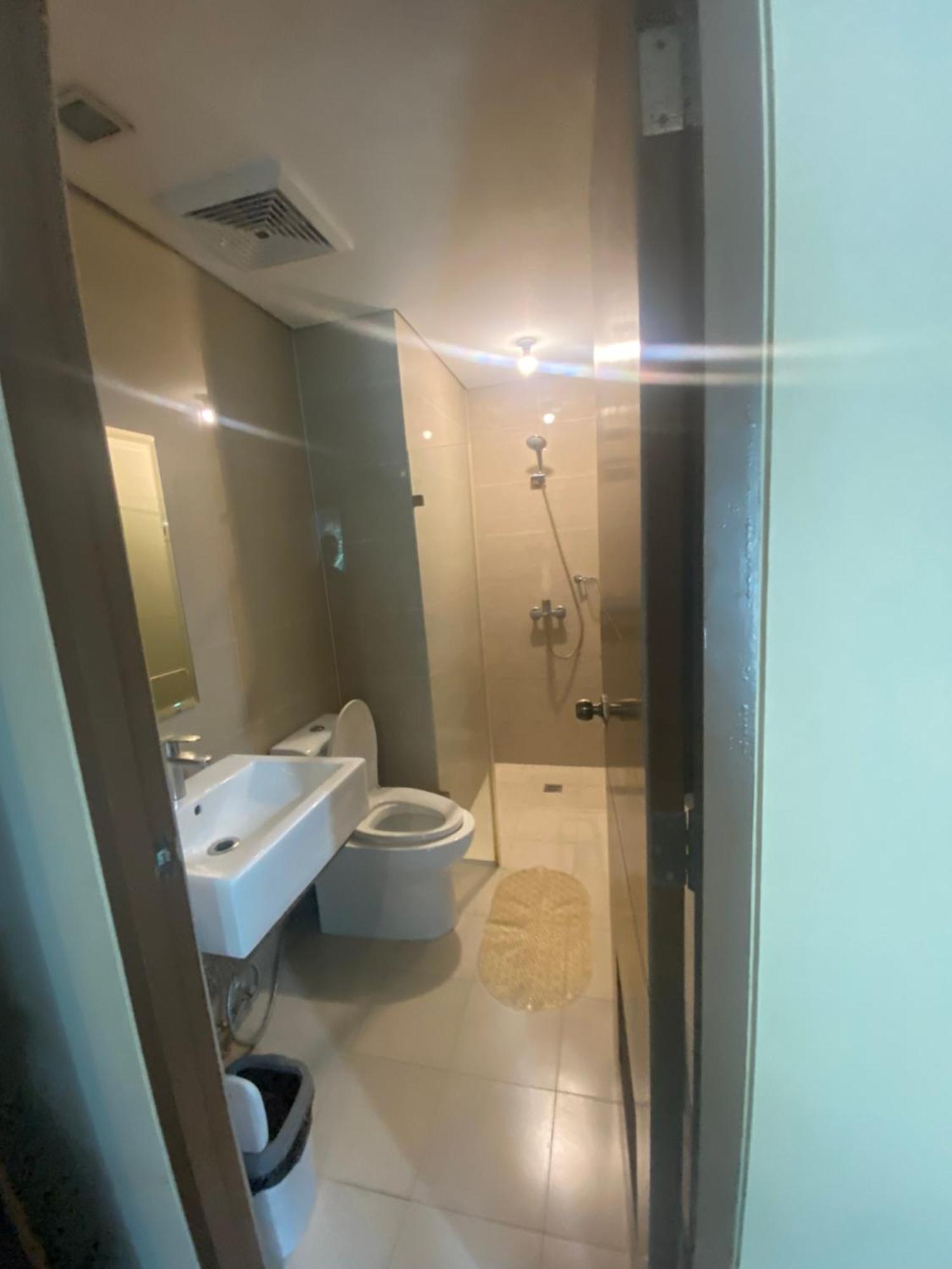 Two Palm Tree Condotel By Kath Manila