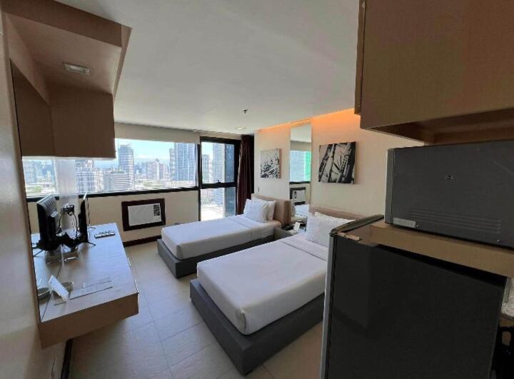 Apartment Spacious & Cozy Type Unit Near Megamall