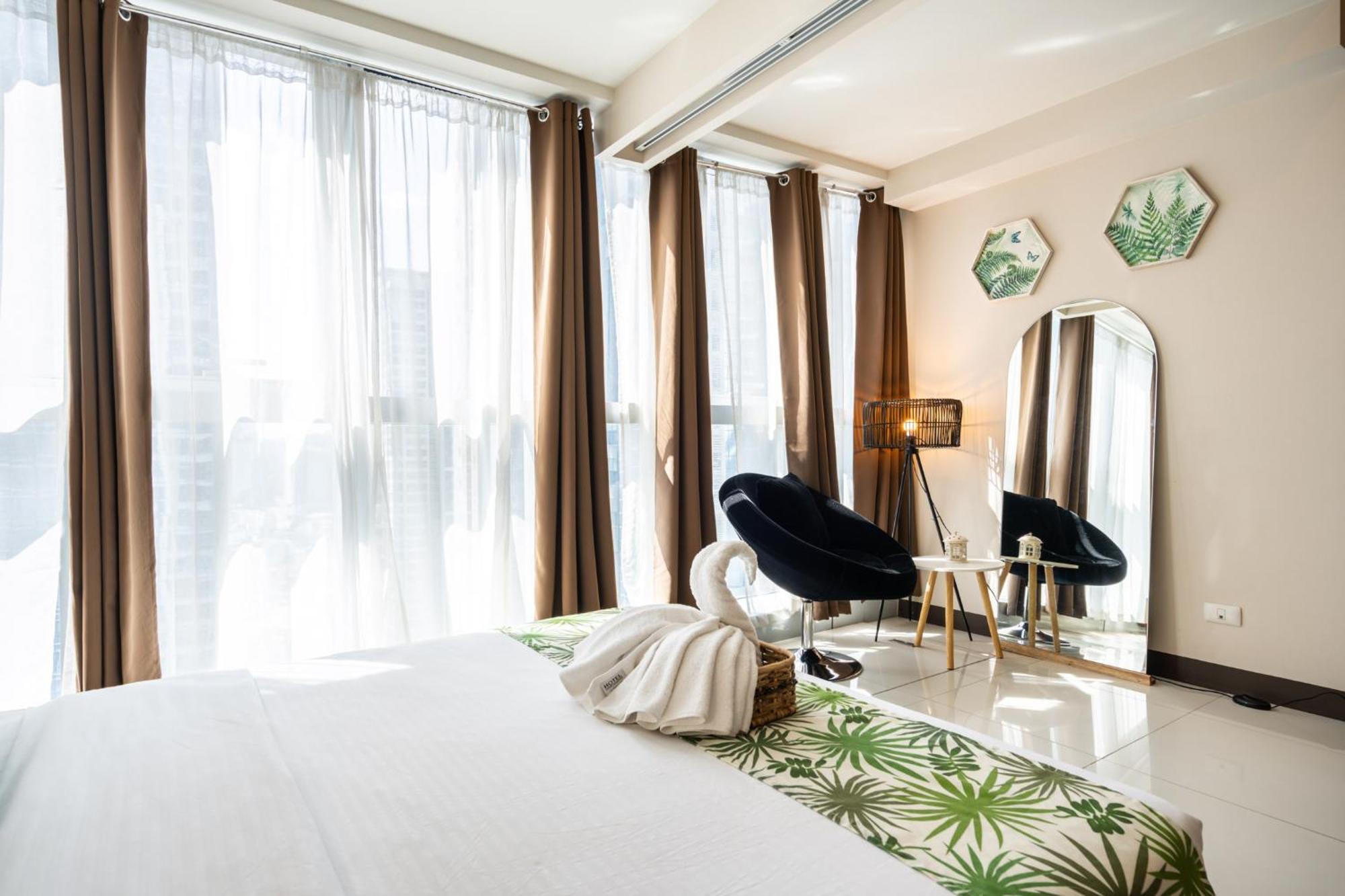 Great Value In Uptown Parksuites Bgc 1br,washer,netflix Apartment Manila