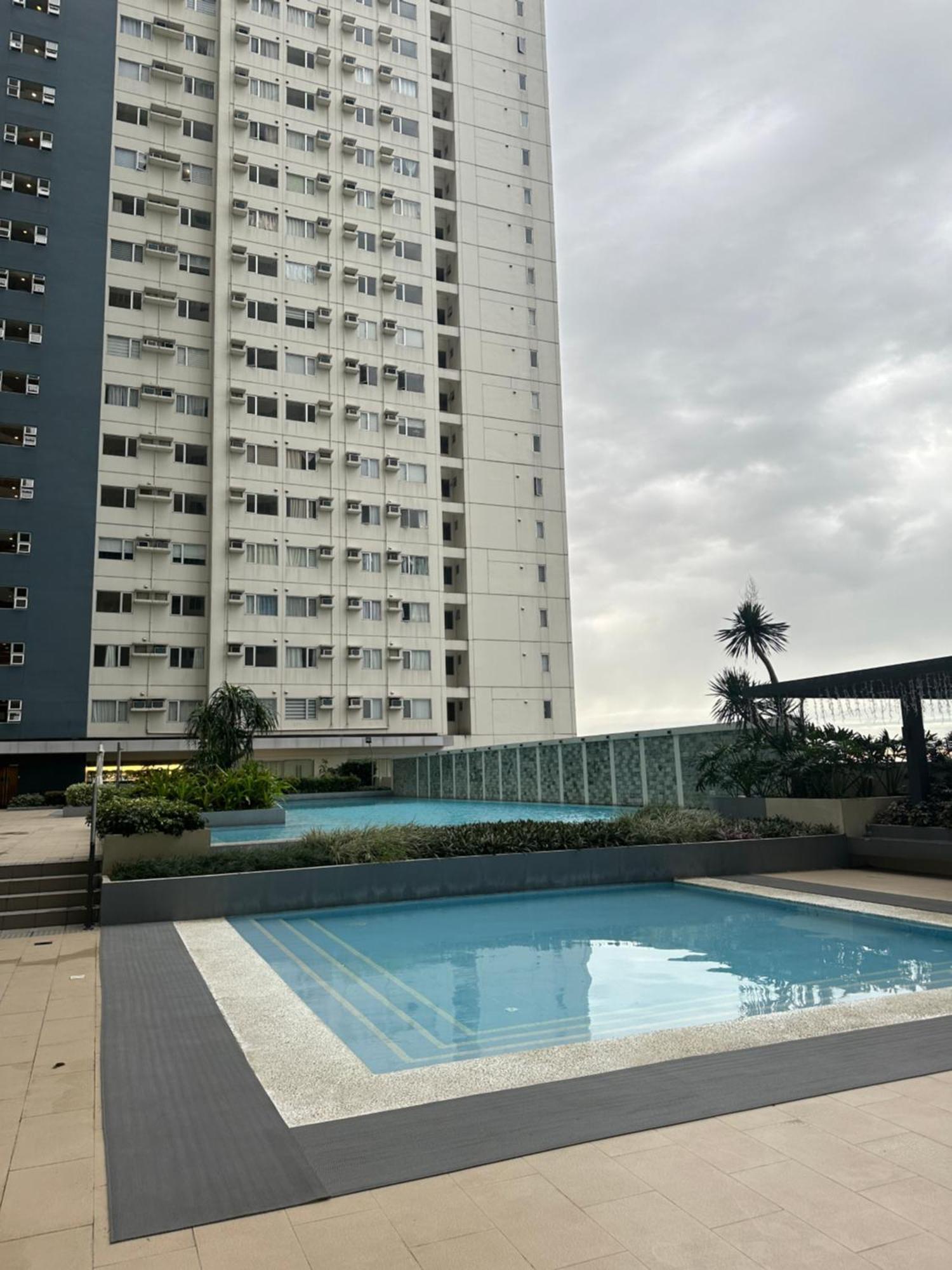 Apartment Cozy Unit Beside Solaire North