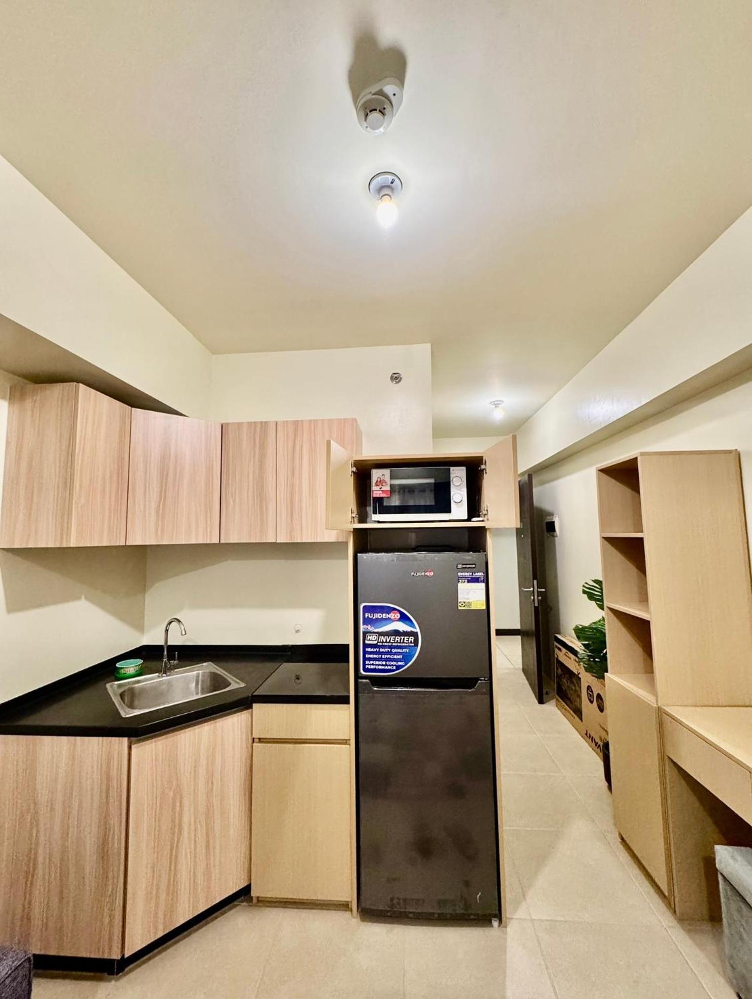 Cozy Unit Beside Solaire North Manila