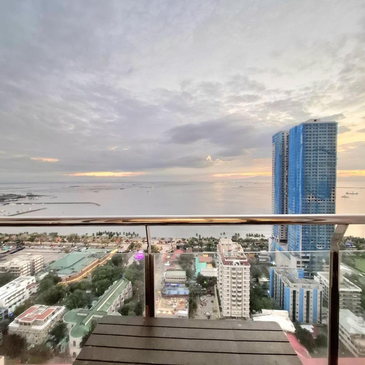 Bayview Luxury Condos: Poolside Balcony Retreats Apartment