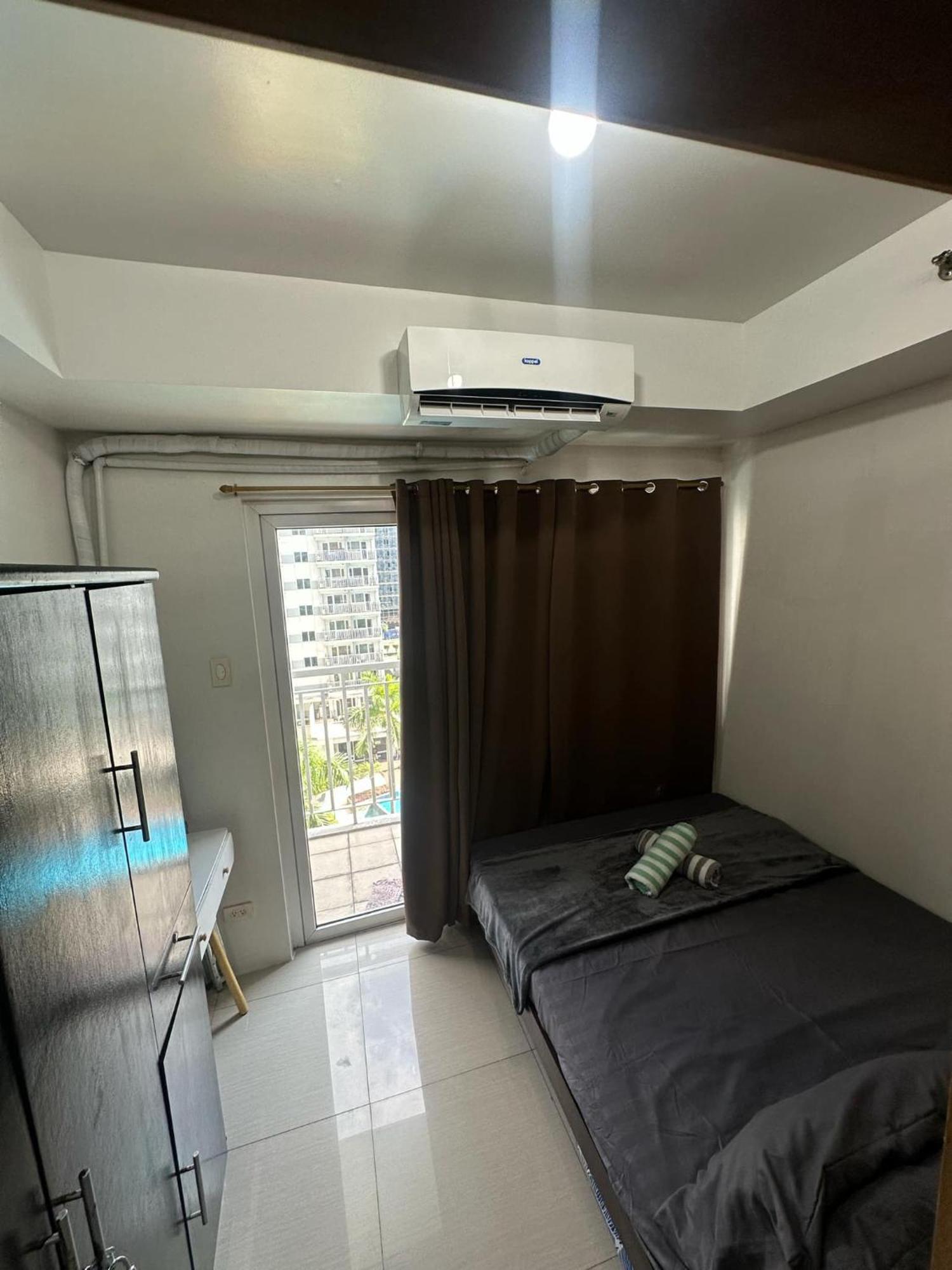 Shell Residences Pool View Apartment Manila