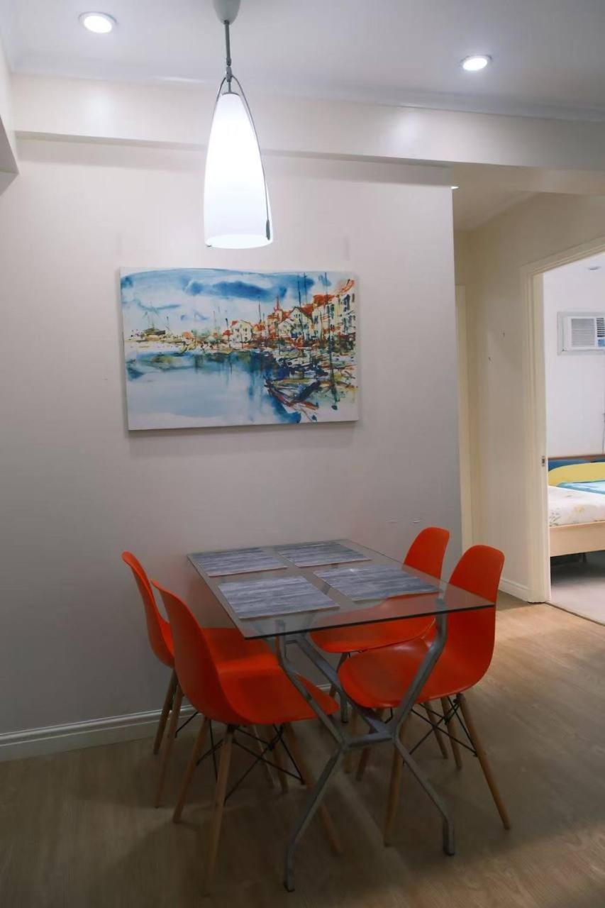 5-mins Sm Aura Cozy 2br Free Parking Apartment