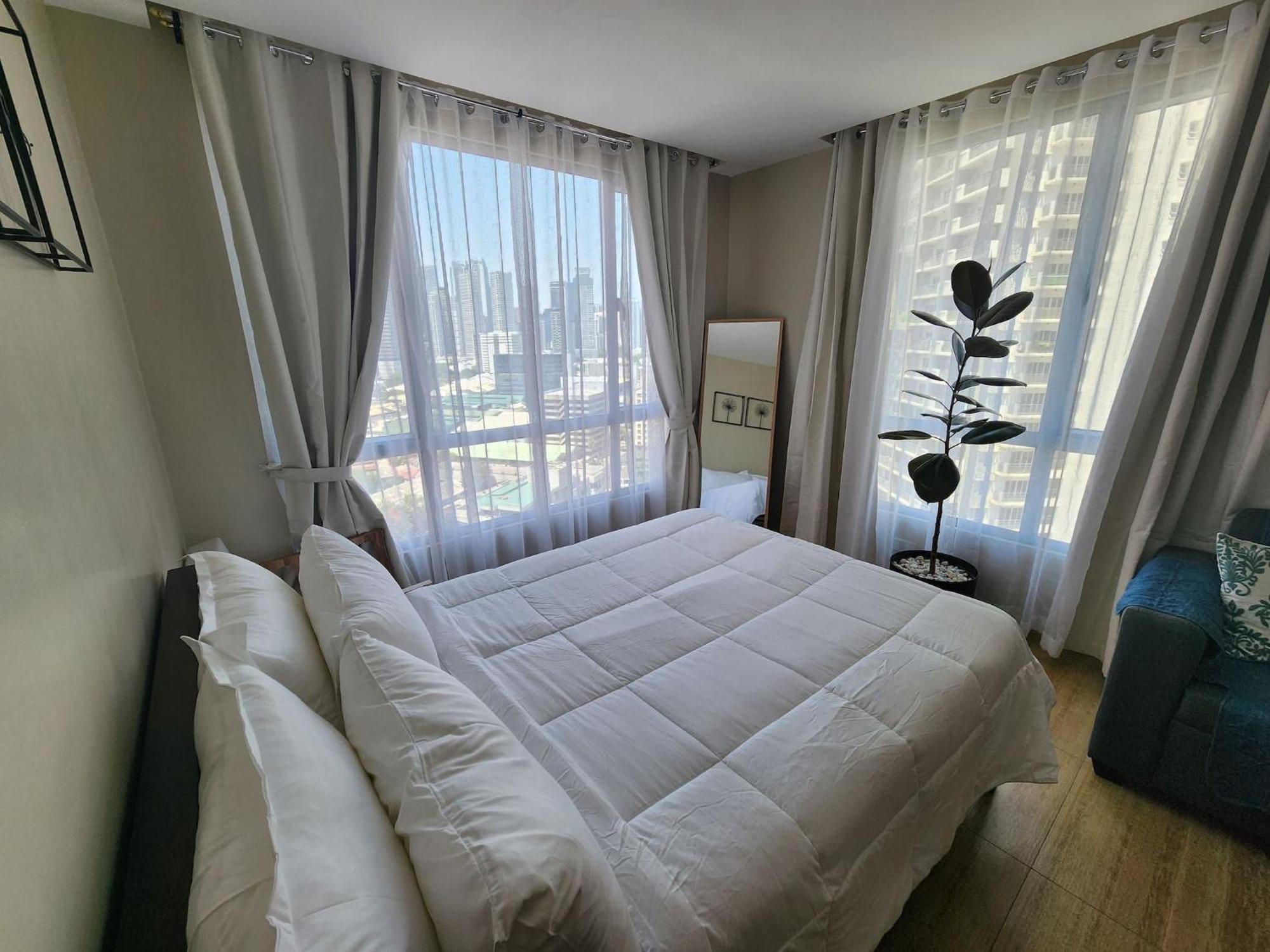 Holiday home Cozy 1br In Mandaluyong With Skyline View