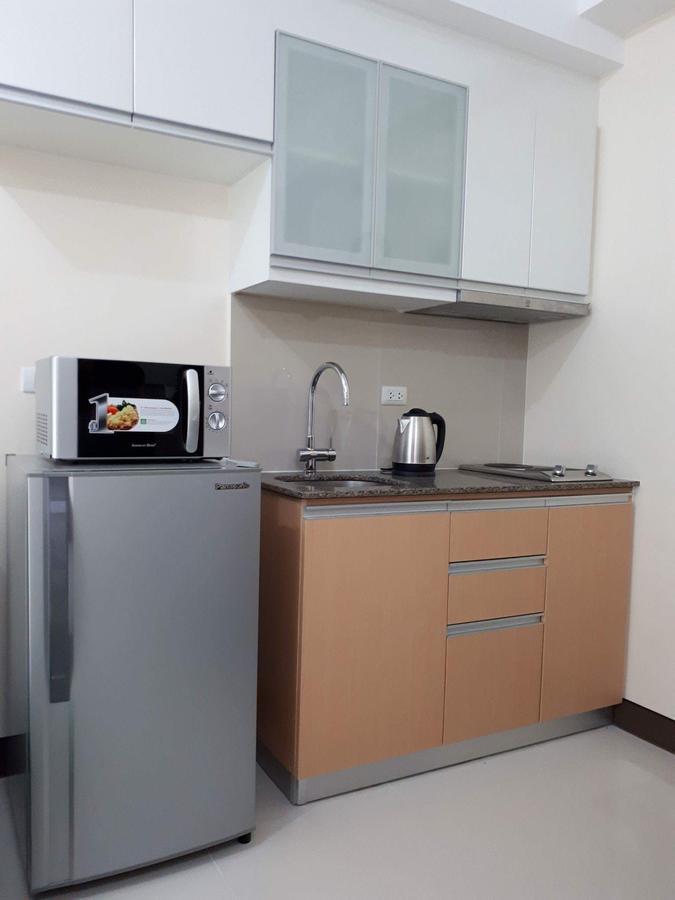 Simple Habitat @ Viceroy Mckinley Hill Apartment