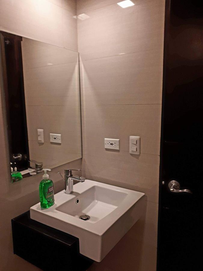 Simple Habitat @ Viceroy Mckinley Hill Apartment