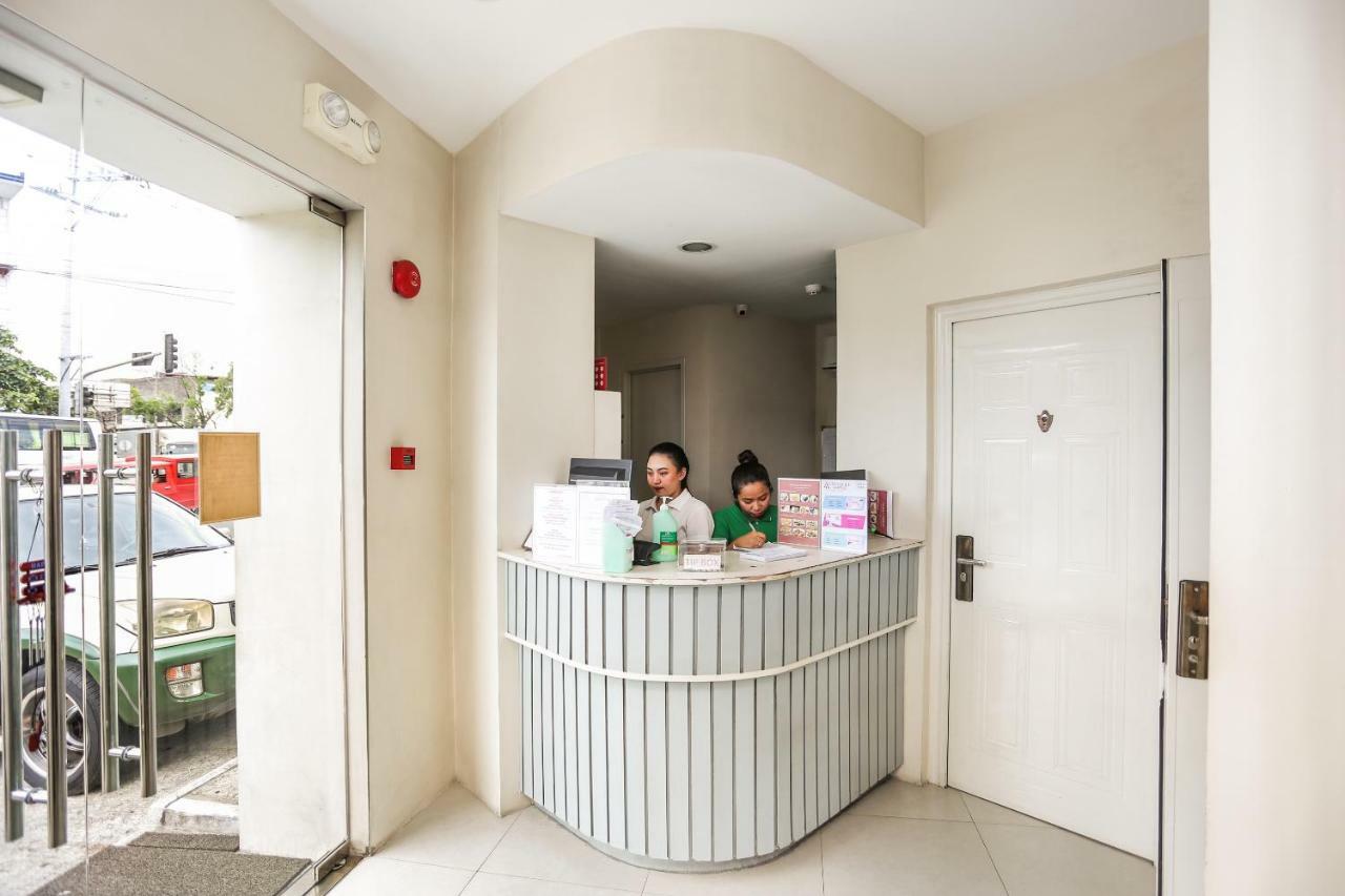 Oyo 393 Triangle Apartelle Hotel Manila