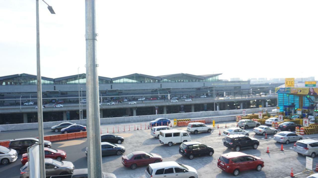 Apartment Palm Tree Across Naia3 By Beth Manila