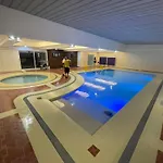 Burgundy Mckinley Place Service Apartment