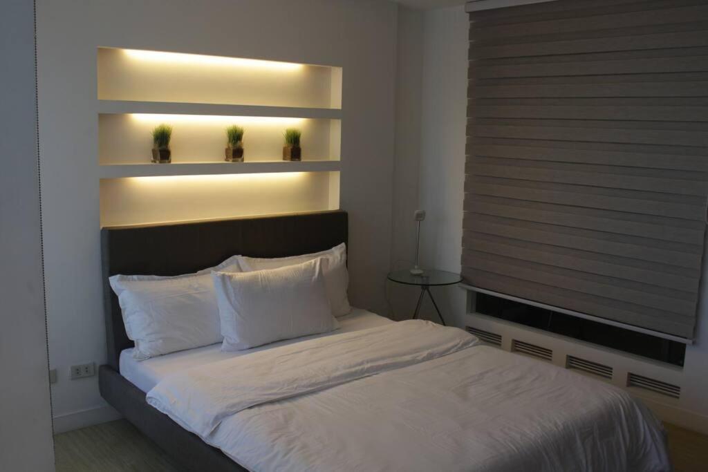 A2j Luxury 1br Bgc Balcony Near Burgoscircle *