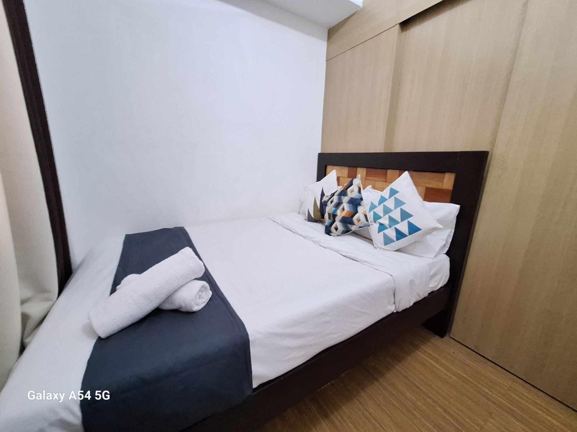 Bright And Cozy 1 Bedroom With Balcony Pool View And Wifi In Grace Residences Apartment Manila