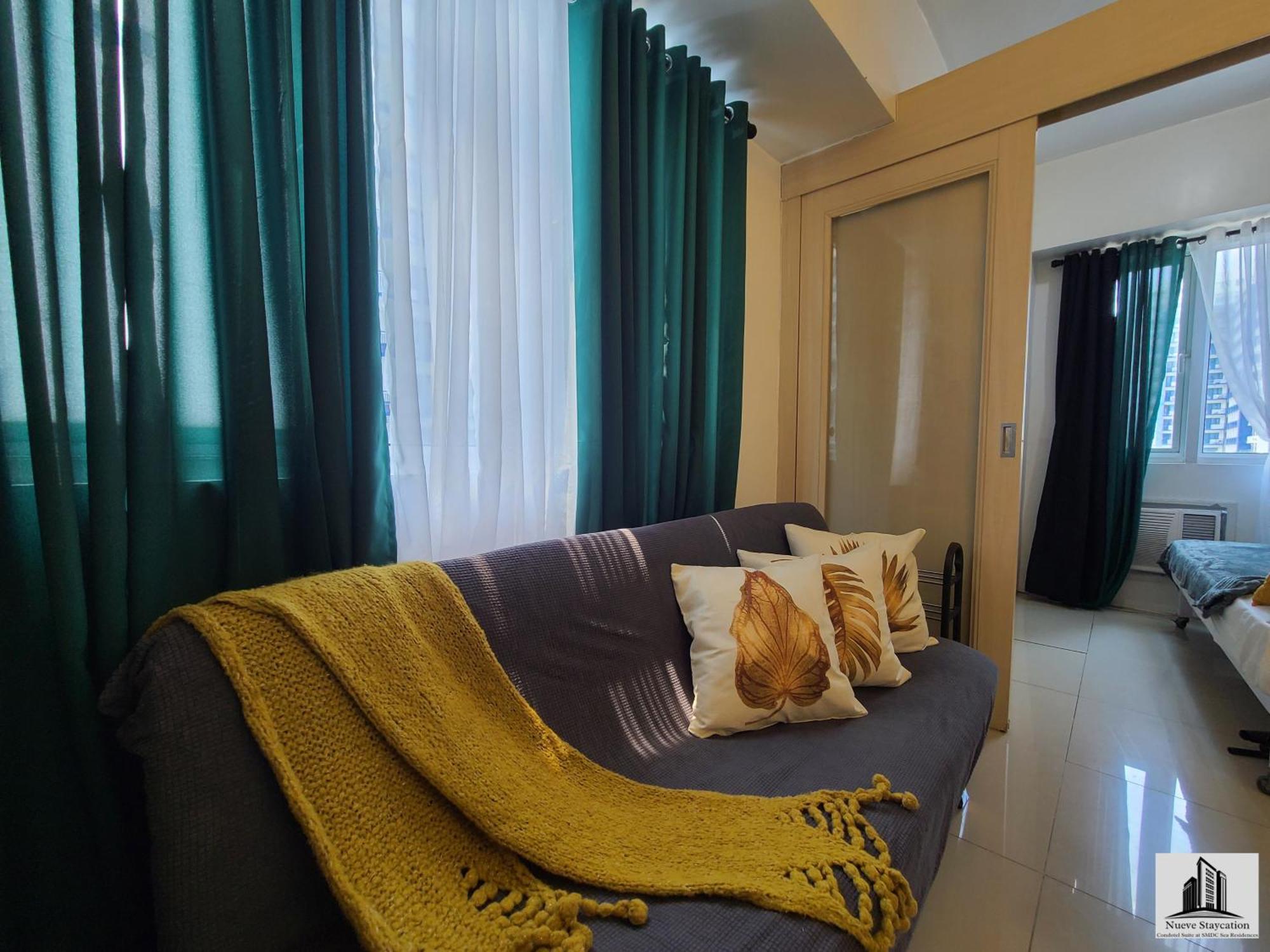 Nueve Staycation Apartment