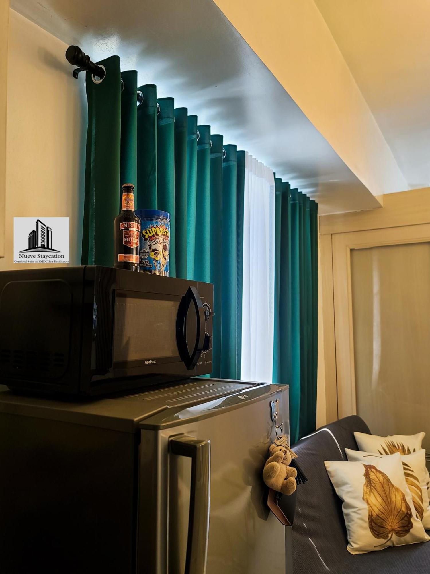 Nueve Staycation Apartment *