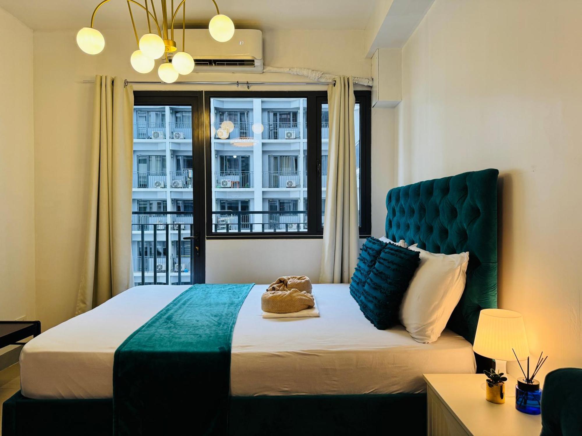 14102 Shore 2 Residences Cozy 1br With Balcony By Prime Apartment Manila