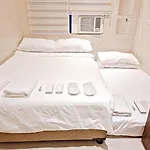 Condo Along Tomas Morato W/ Wifi Smarttv & Karaoke