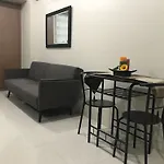One Palm Tree Apartments