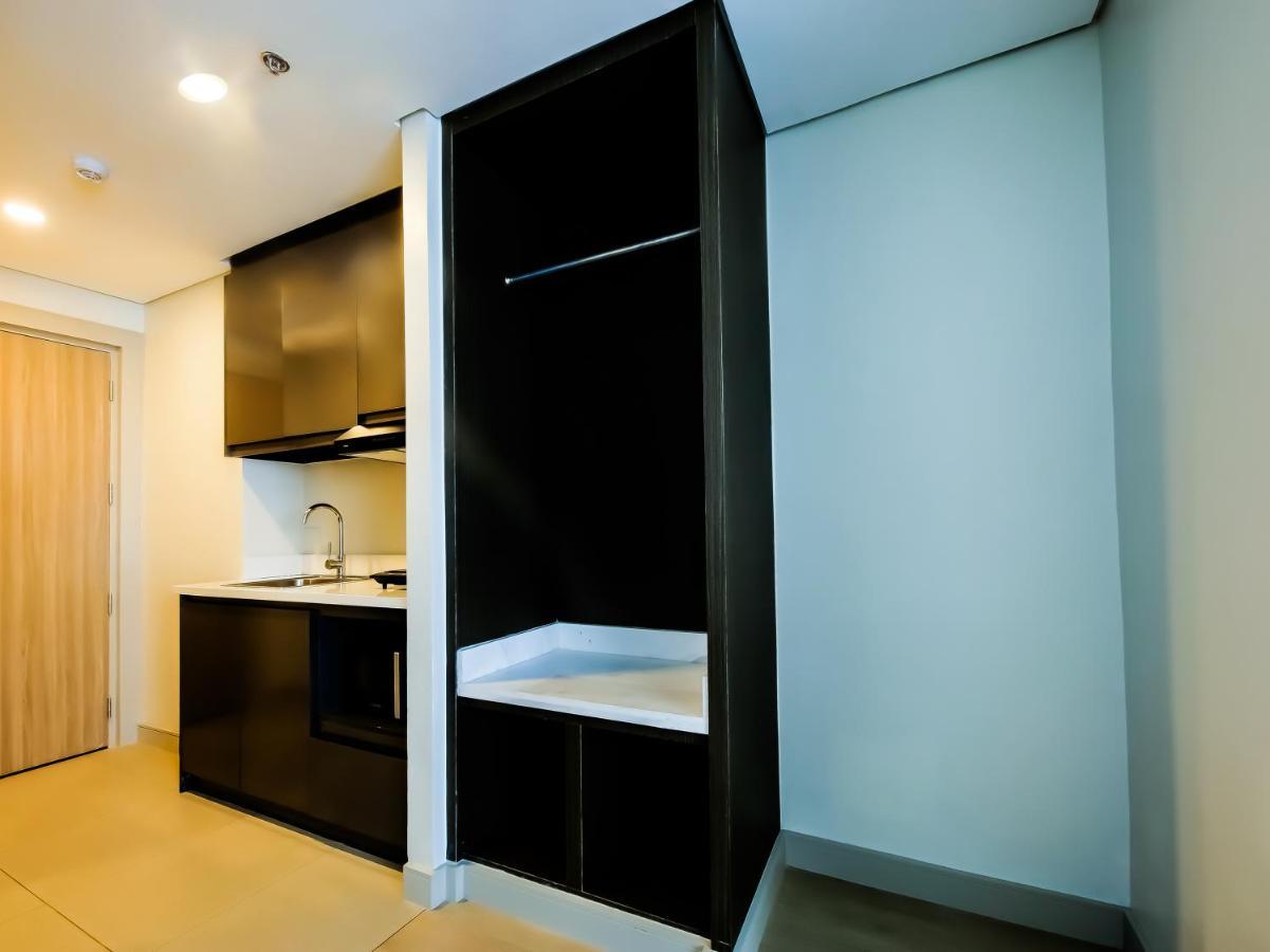 Capital O 804 The Residences At Bonifacio Civic Center Hotel 3*