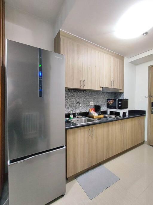 Apartment Jovis Place Staycation Near Moa Manila