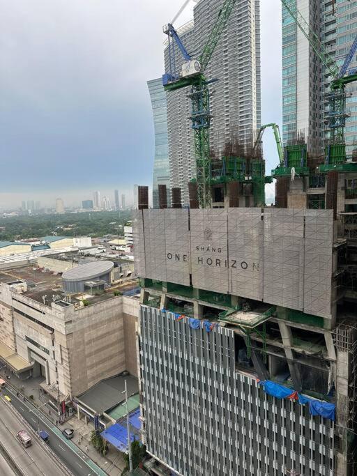 Spacious 2-bedroom Corner Unit Across Shangri-la Apartment Manila