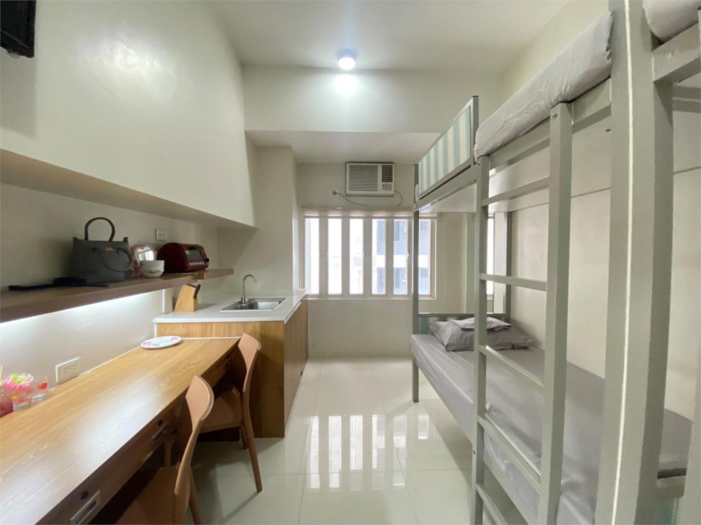 Uhome Lacson *