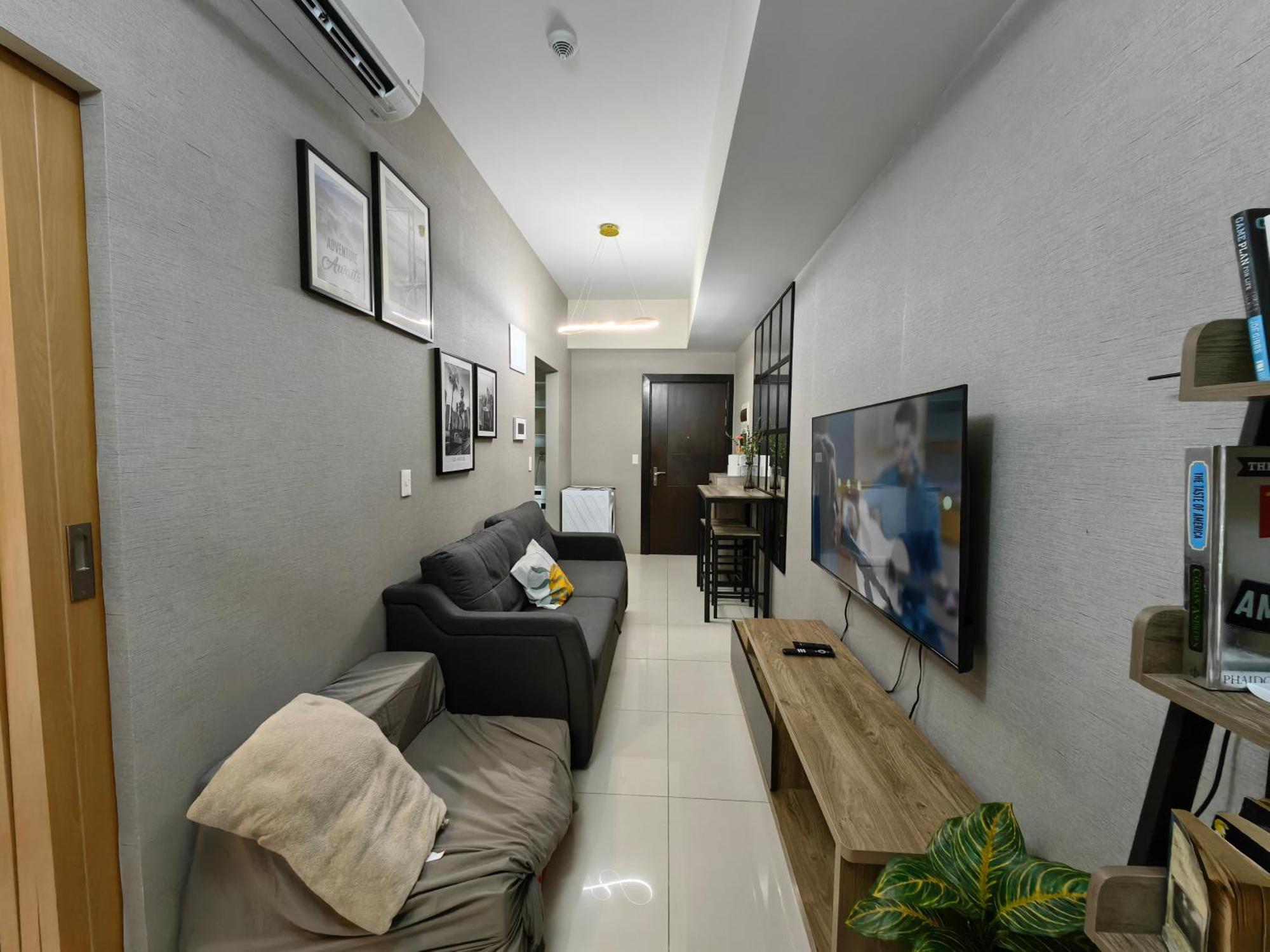 Cozy 1br With Balcony And Netflix In Uptown Bgc Manila