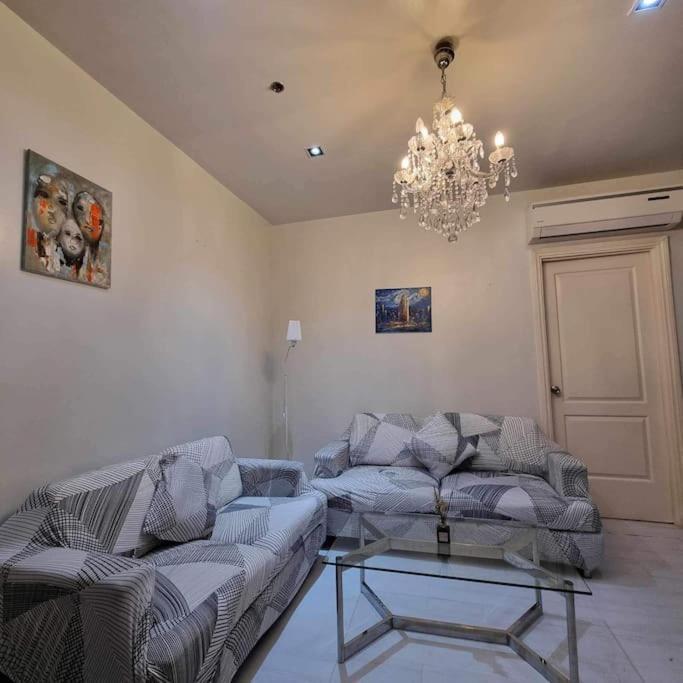 Cozy Two Bedroom Flat In The Gramercy Residences Apartment