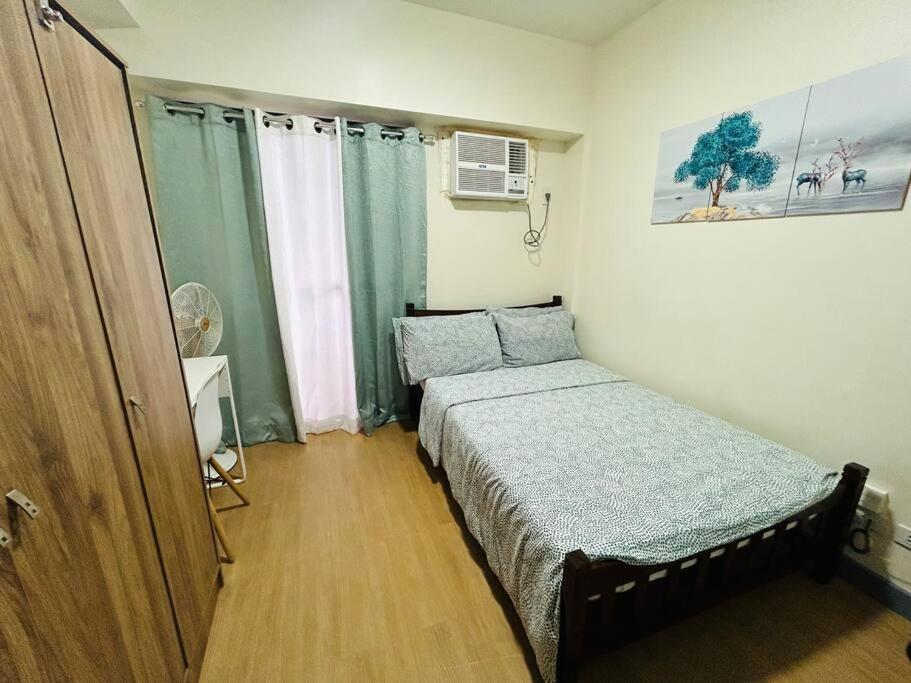 Apartment 1br Calathea Place Nr Airport, Netflix,50mbps Wifi Manila