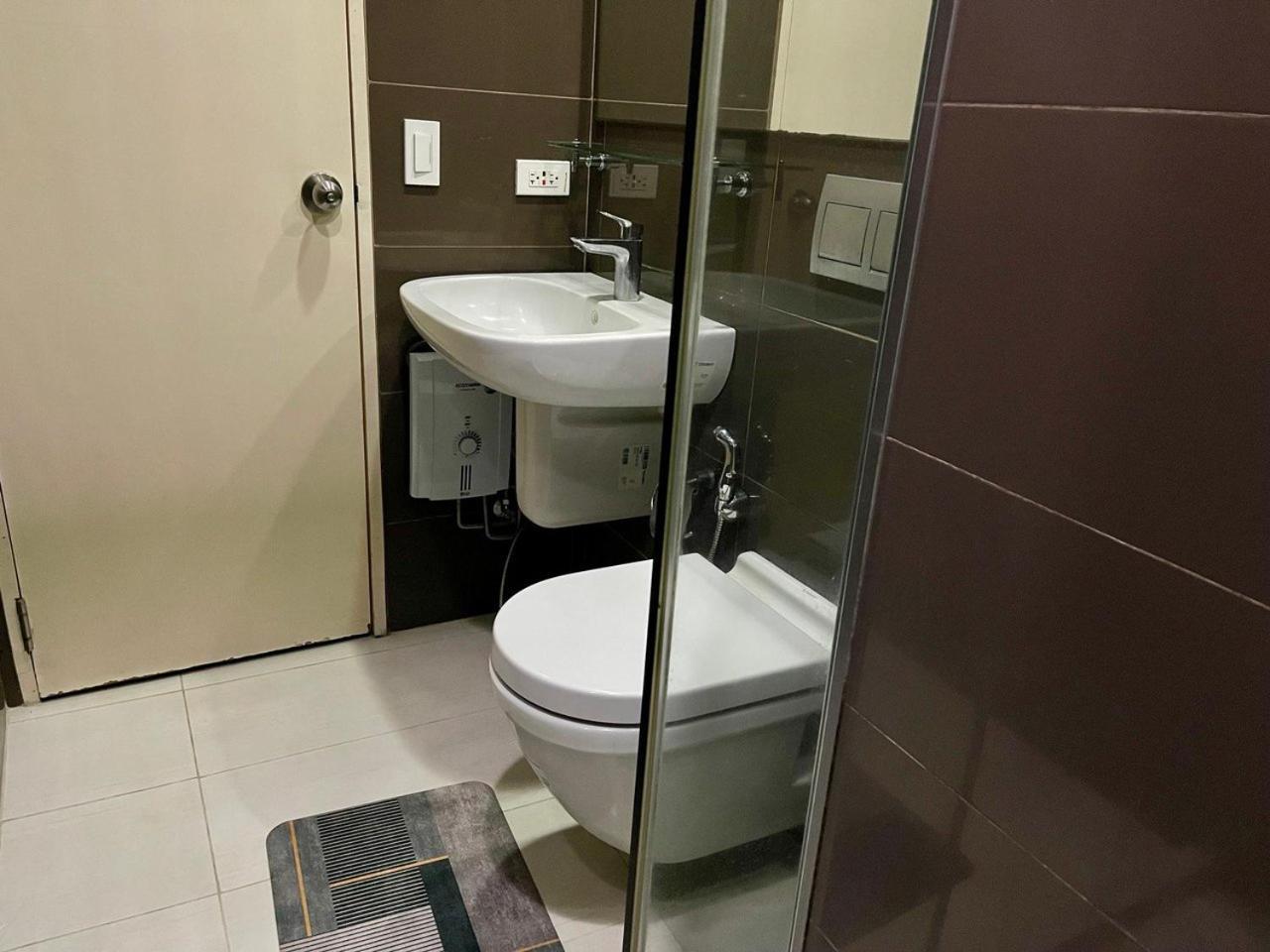 Homey 1br Acqua Livingstone With Netflix, Pool & Gym Apartment
