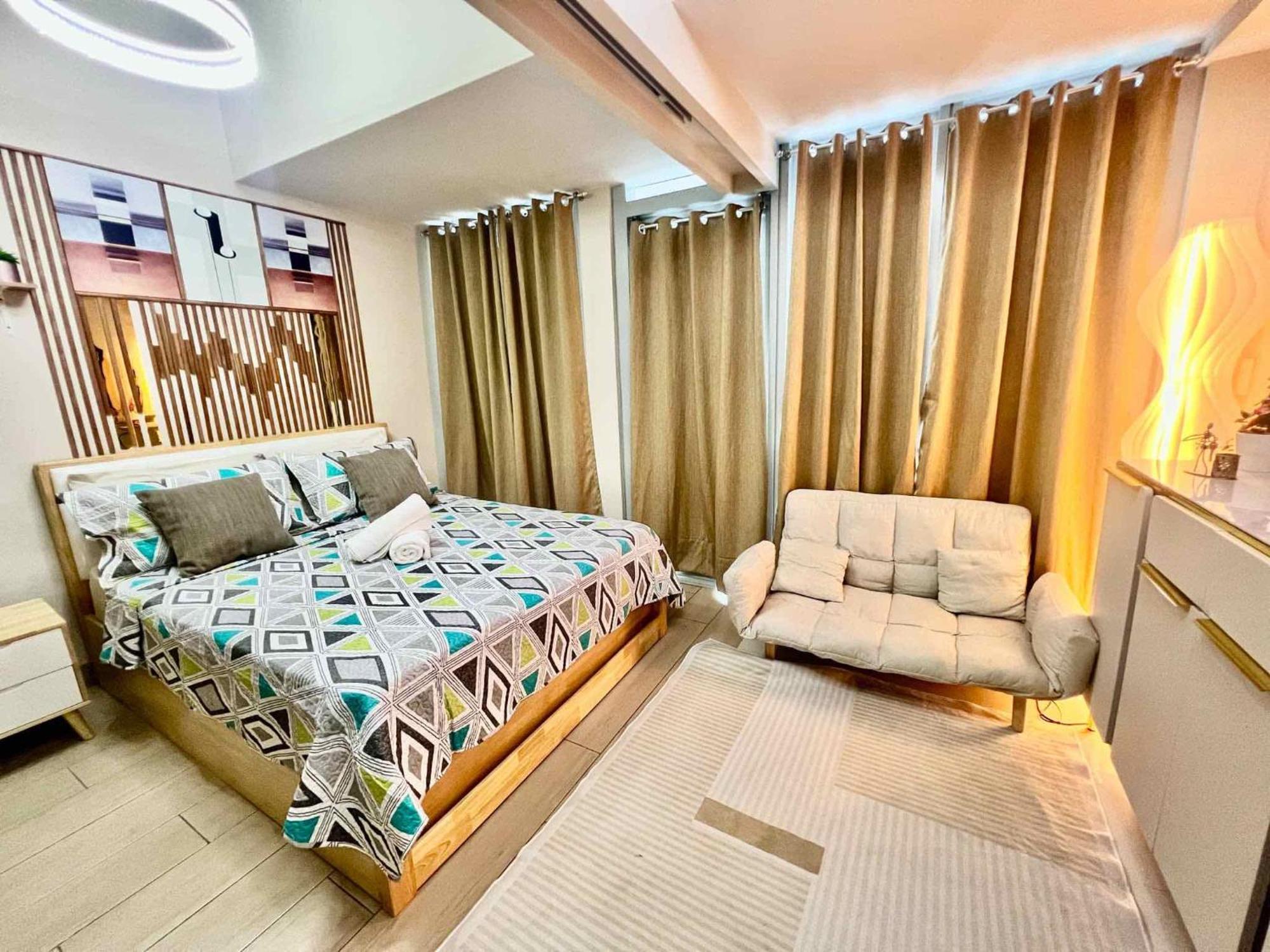 Nuhomes Staycation Escape At Uptown Parksuites Tower 2 * Manila